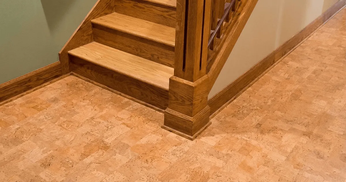 End of a staircase with cork flooring in Arvada, CO