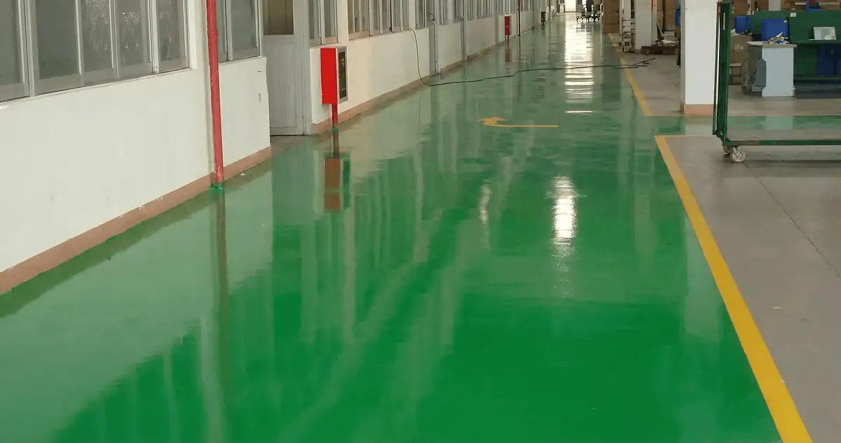 A factory floor professionally covered and marked with epoxy flooring in Arvada, CO