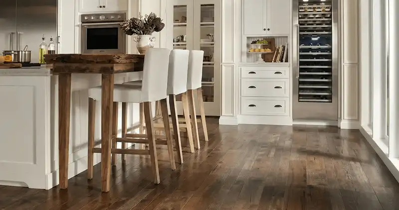 Professionally installed and refinished hardwood flooring in a residential home, showcasing smooth finish and natural wood tones in Arvada, CO