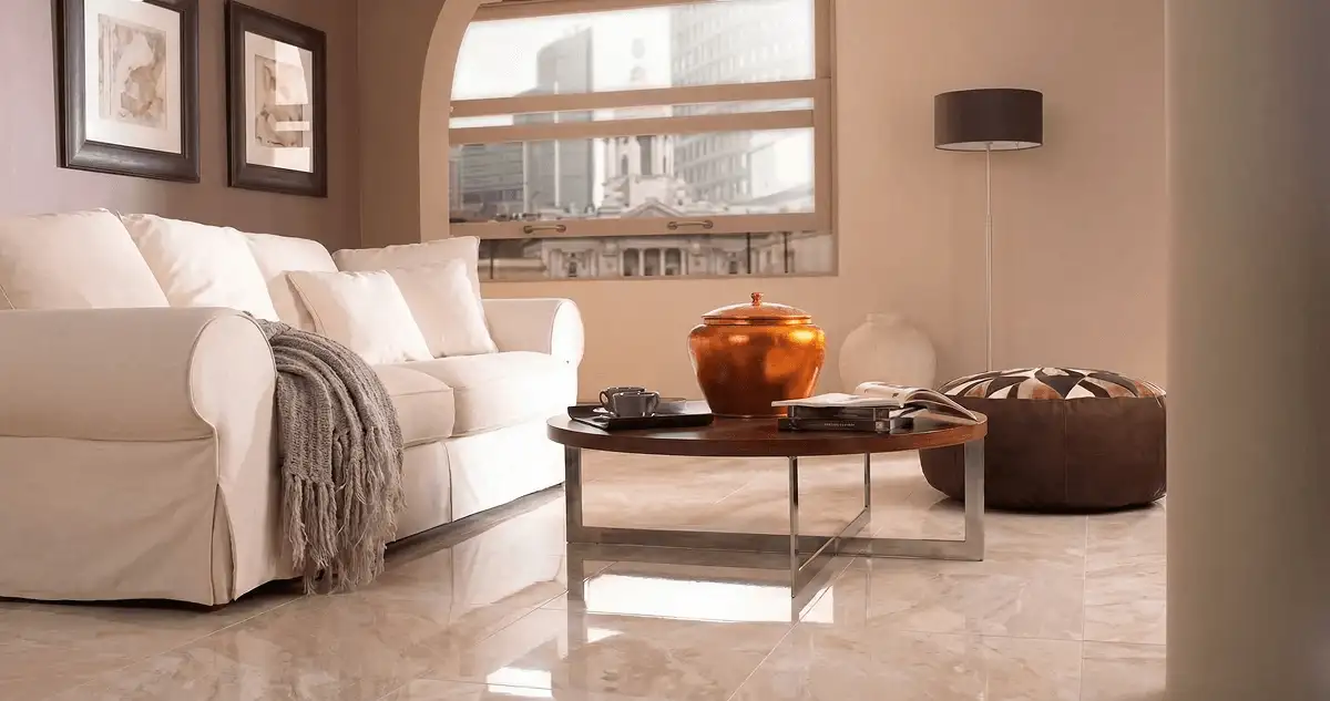 Modern living room with professionally installed marble flooring, a beige sofa, coffee table in Arvada, CO
