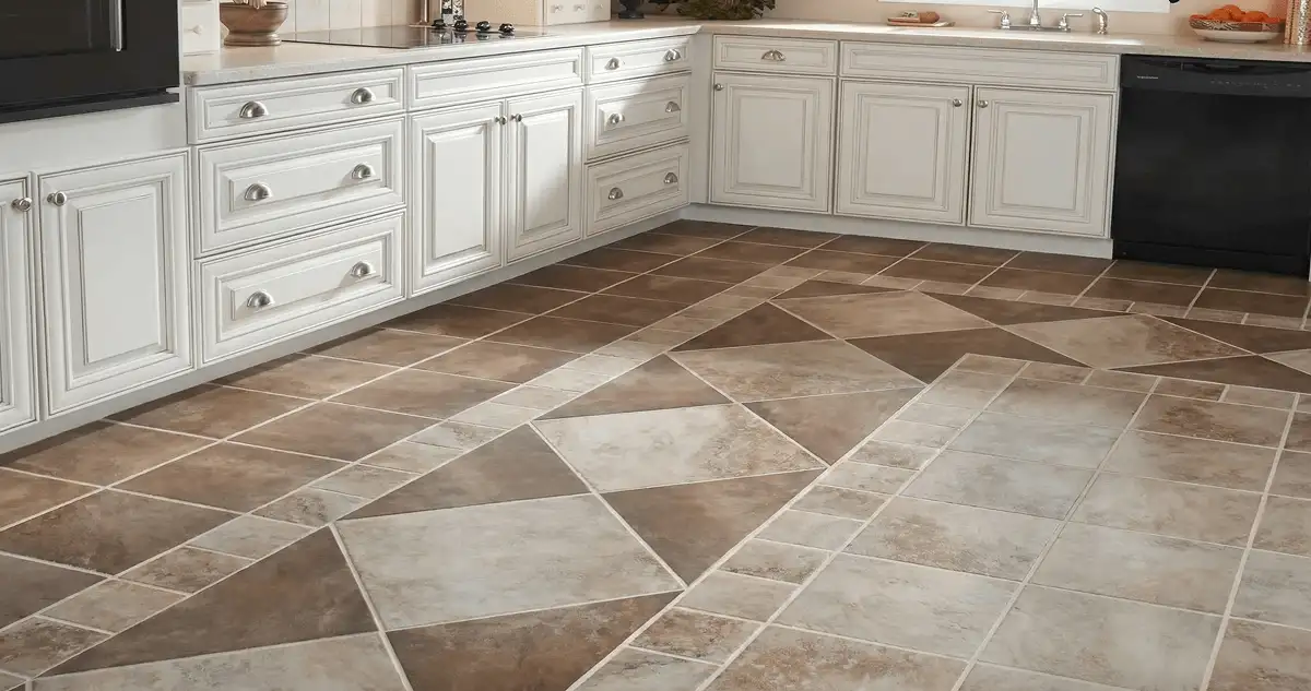 Kitchen with white cabinets and a professionally installed tile floor in Arvada, CO